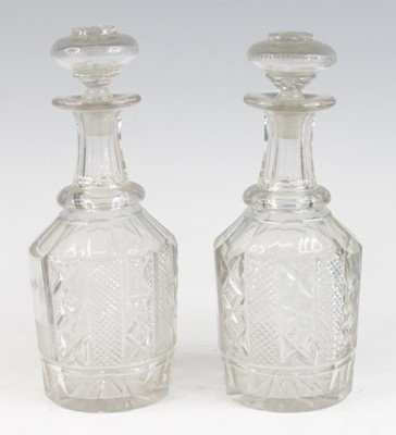 Lot 2052 - A pair of glass decanters, early 19th century,...
