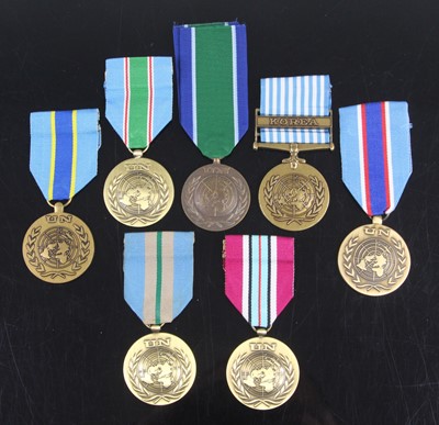 Lot 53 - A collection of seven United Nations medals,...