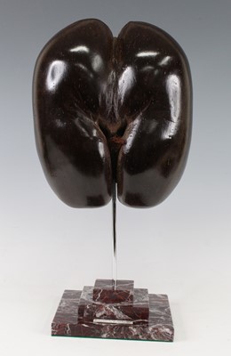 Lot 2311 - A half coco de mer nut (lodoicia maldidica),...