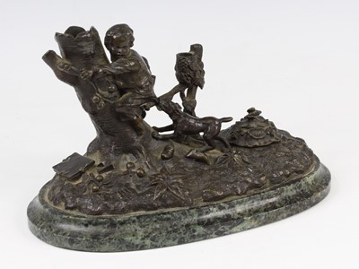 Lot 2315 - A circa 1900 bronze inkstand, of oval form,...