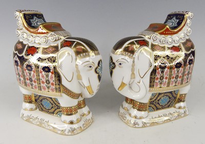 Lot 2024 - A pair of Royal Crown Derby elephants, each...