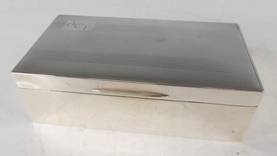 Lot 560 - A late Art Deco silver table cigarette box,...