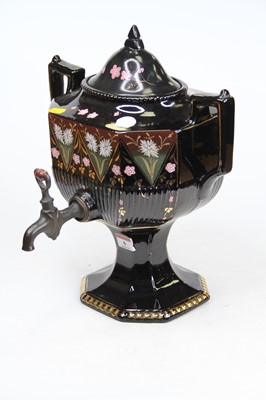 Lot 6 - A Victorian black glazed pottery twin handled...