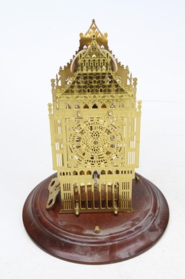 Lot 10 - A 20th century brass mantel clock in the form...