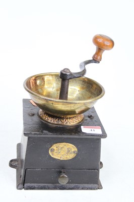 Lot 41 - A vintage cast iron coffee grinder, height 21cm