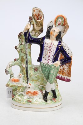 Lot 64 - A Victorian Staffordshire flat back figural...