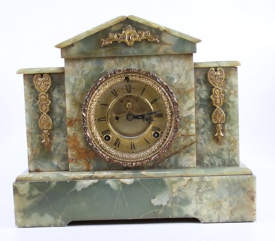 Lot 180 - A circa 1900 onyx mantel clock of...