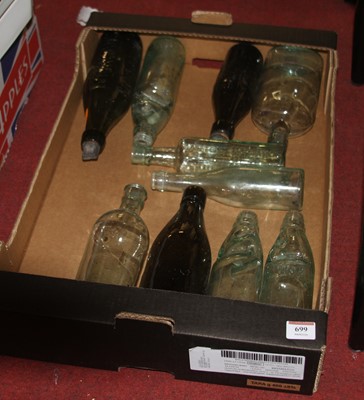 Lot 699 - A collection of vintage advertising bottles,...