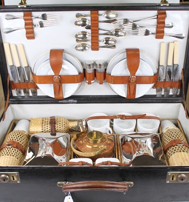 Lot 528 - A mid 20th century picnic set comprising flat...