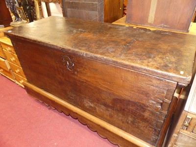 Lot 1411 - An 18th century rustic oak and elm hinge top...