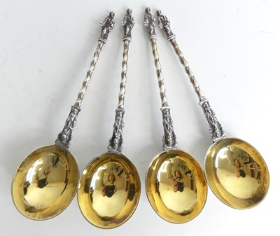 Lot 1137 - A set of four Victorian silver gilt apostle...