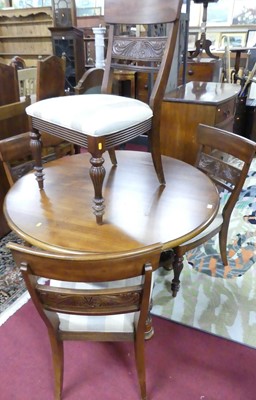 Lot 1278 - A contemporary cherry wood dining suite by...