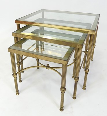 Lot 374 - A 1970s French gilt brass nest of three...