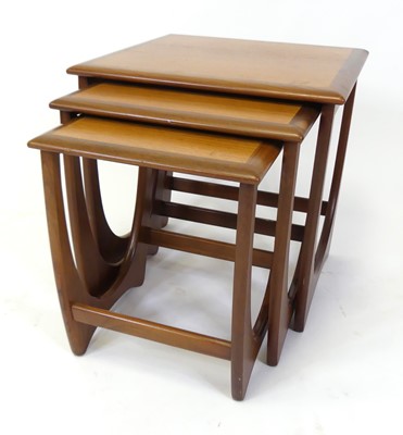 Lot 298 - A 1960s G-Plan teak 'Fresco' nest of three...