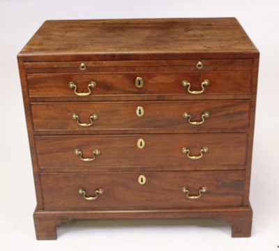 Lot 1528 - A George III mahogany chest having a caddy top...