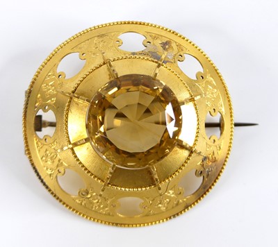 Lot 2510 - A yellow metal Etruscan style target brooch,...