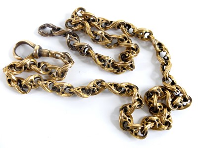 Lot 2511 - A yellow metal fancy figure-of-eight style...