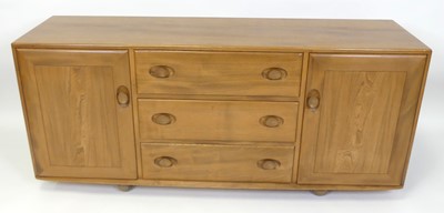 Lot 309 - An Ercol blond elm Windsor sideboard, model No....