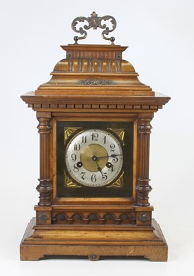 Lot 11 - An early 20th century continental walnut cased...