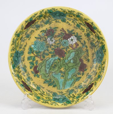 Lot 6 - A Chinese yellow glazed dish, decorated with...