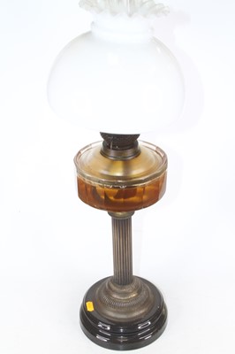 Lot 111 - A Victorian oil lamp, having an opaque glass...