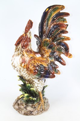 Lot 129 - A large glazed pottery model of a cockerel,...