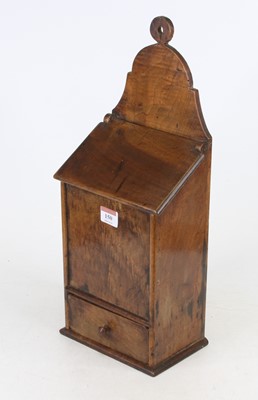 Lot 150 - A 19th century fruitwood wall hanging salt and...