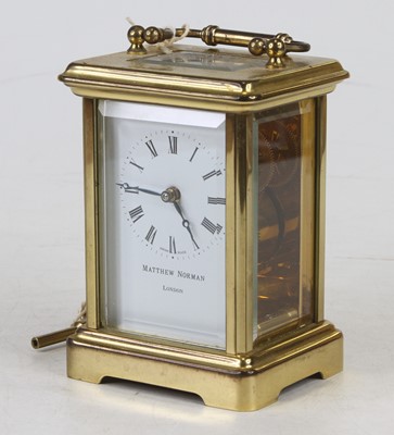 Lot 174 - A 20th century lacquered brass carriage...