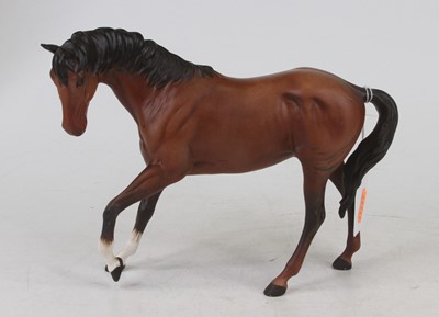 Lot 200 - A Beswick matt painted pottery figure of a...