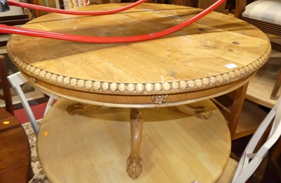Lot 1276 - A contemporary blond oak circular low pedestal...