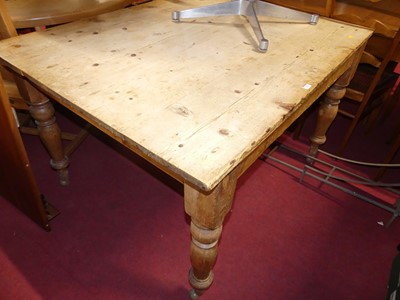 Lot 1282 - A rustic compact kitchen table, raised on...