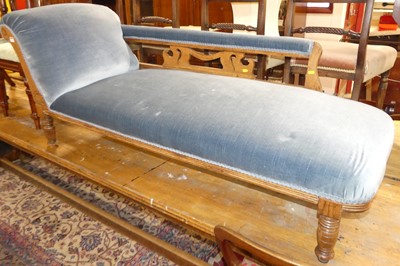 Lot 1293 - A late Victorian oak framed day bed, having...