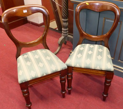 Lot 1294 - A set of four mahogany balloon back dining...