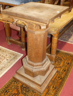 Lot 1316 - A circa 1900 oak imposing square pedestal...