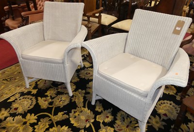 Lot 1340 - A pair of Lloyd Loom white painted wicker...