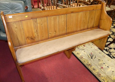 Lot 1349 - A rustic stained and planked pine long church...