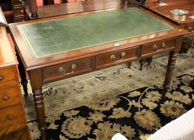 Lot 1364 - A mahogany and gilt tooled green leather inset...