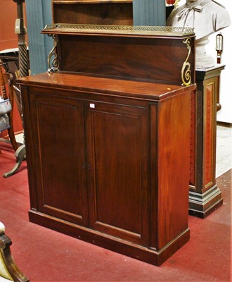 Lot 1376 - A George IV mahogany and pierced brass mounted...