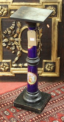 Lot 1378 - A circa 1900 ebonised and painted porcelain...