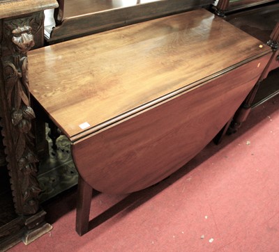 Lot 1383 - A George III mahogany dropleaf dining table,...