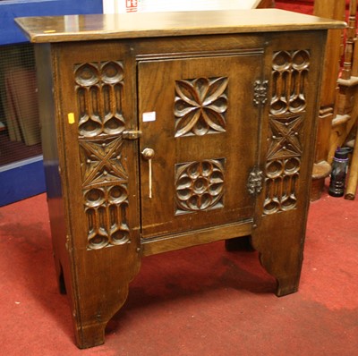 Lot 1384 - An Ipswich joined oak and floral relief...