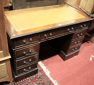 Lot 1398 - A reproduction mahogany and gilt tooled tan...