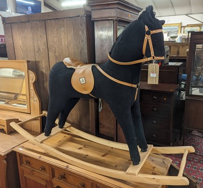 Lot 1402 - A Mamas & Papas child's plush rocking horse,...