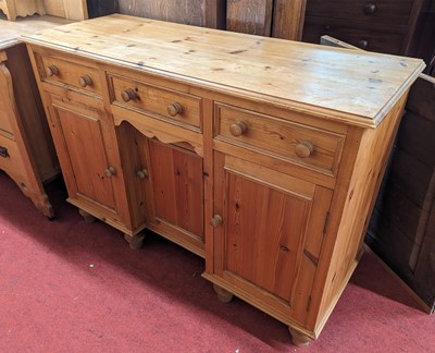 Lot 1403 - A contemporary pine dresser base, fitted with...