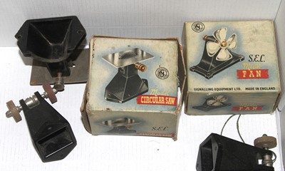Lot 1526 - A box containing a miniature toy circular saw,...
