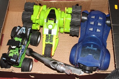 Lot 1563 - Two boxes of plastic toys to include Batmobile,...