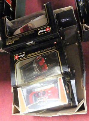 Lot 1612 - A box of Burago boxed vehicles to include...