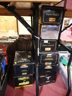Lot 1614 - Eight mixed Maisto and Burago boxed vehicles,...