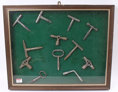 Lot 112 - A framed and glazed display of various vintage...