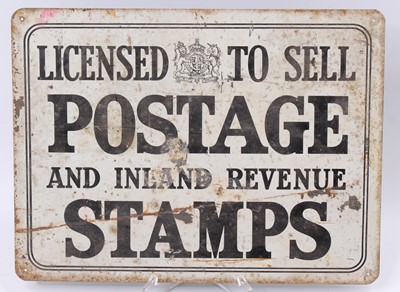 Lot 115 - An original tin "Licenced to sell Postage and...